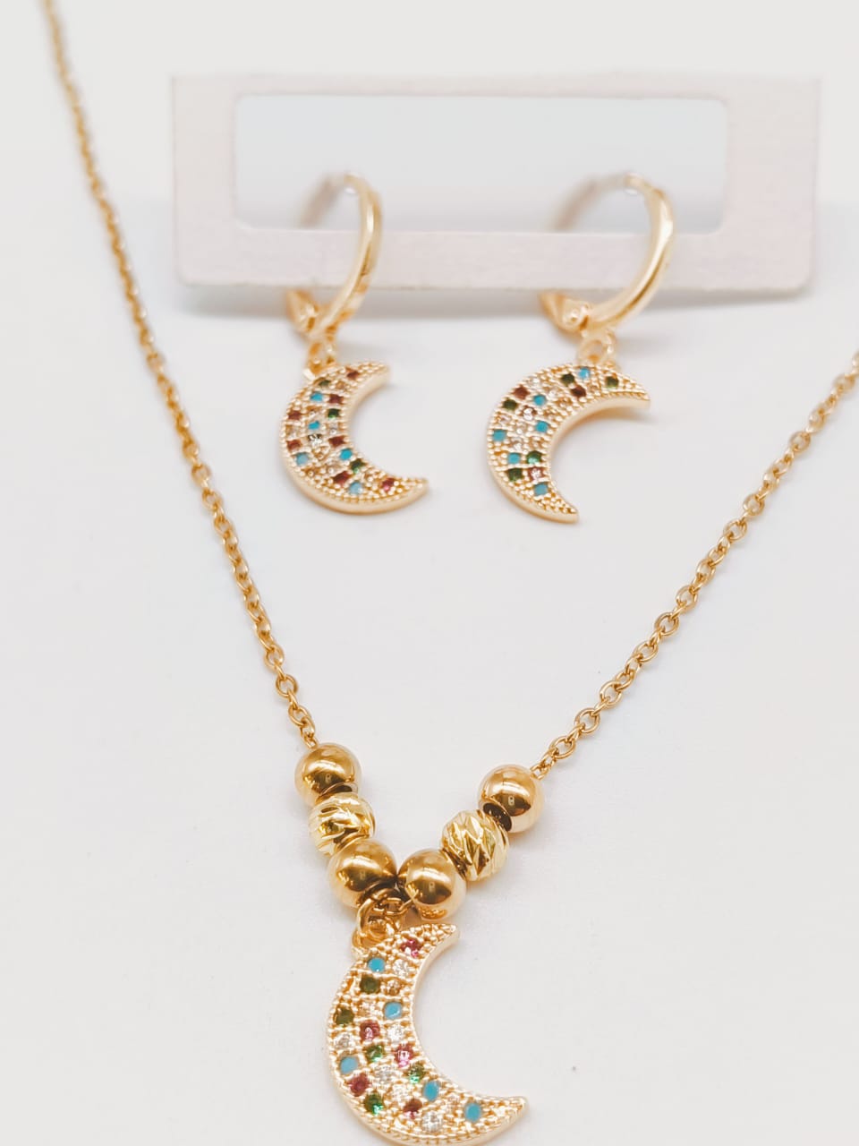 Juego dorado luna multicolor.