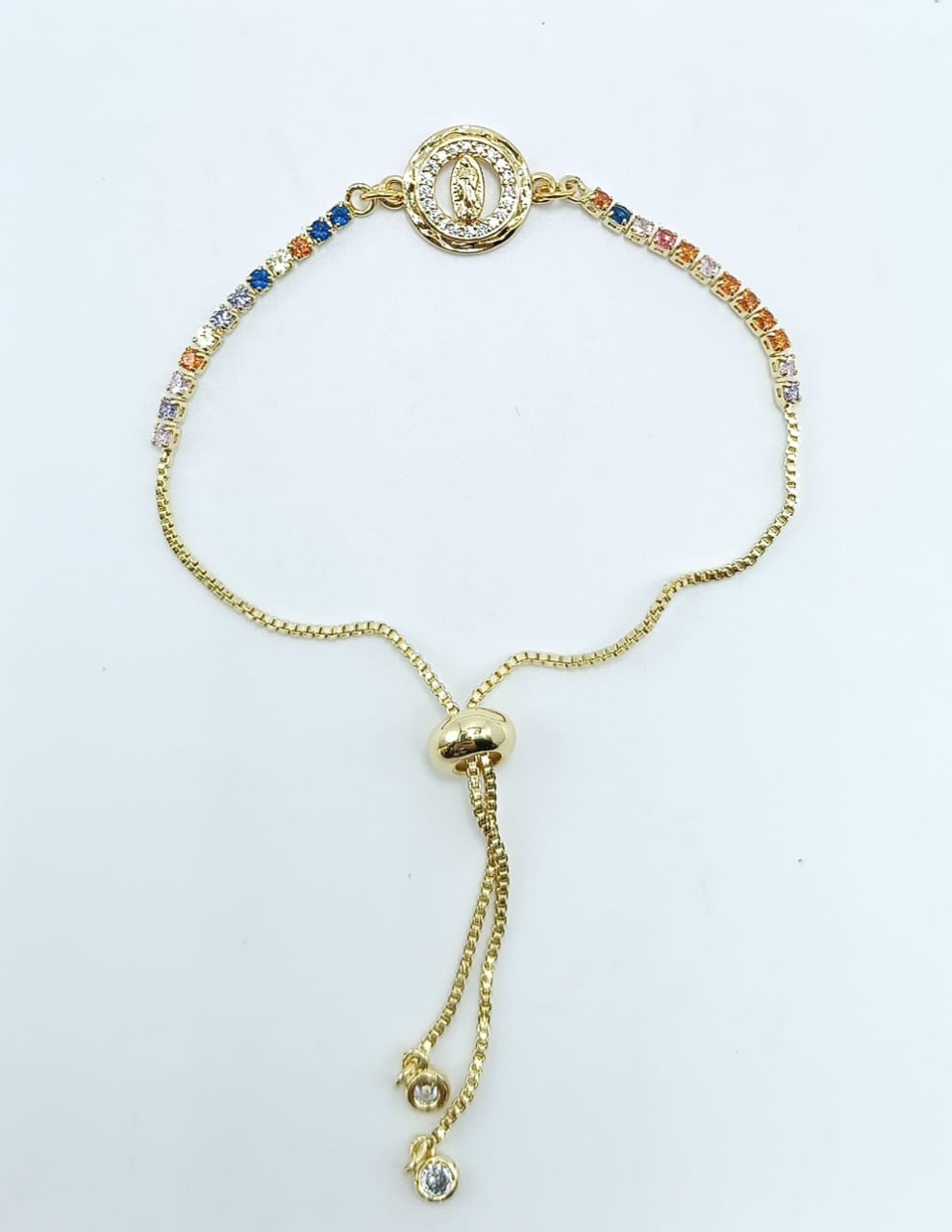 Pulsera rodinada y circón virgen. Dorado y Plateado